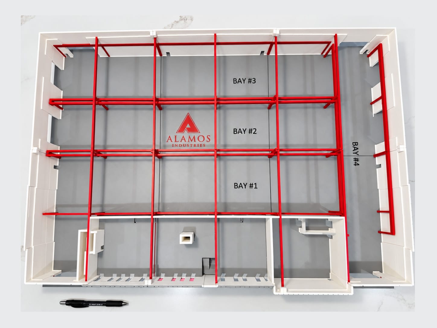 Plan view of the model: Alamos Industries logo on the floor, Bay #1 to #4 labels, red roof girders